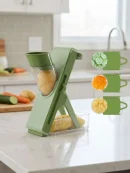 View of adjustable mandoline slicer blades and dial, showing how this aloo aur pyaaz katne wali machine creates perfect cuts.