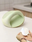 Person peeling protective backing for aasan installation self adhesive knob with strong sticky tape drawer handle.