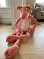 A massive 120 cm stuffed animal sitting on the floor, making it a huge pink panther cartoon plushie and perfect birthday gift for kids.