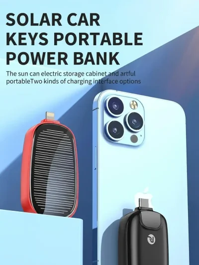 A red and black keychain emergency power supply plugged directly into an iPhone for instant charging without messy cables.