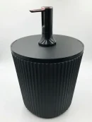 Bedside table with automatic water dispenser in modern stone finish for bedroom convenience.