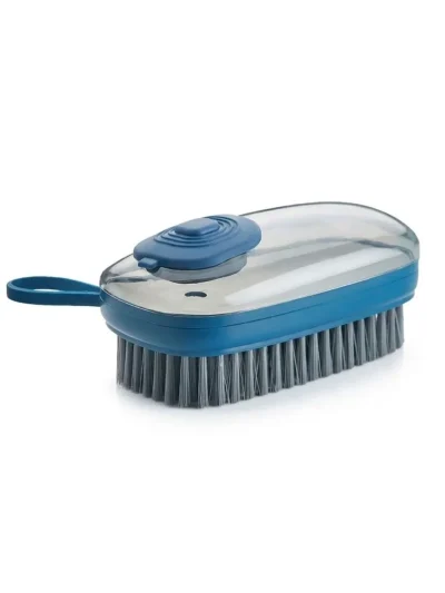 Reusable household scrubbing tool with dense soft bristles and liquid soap filling chamber.